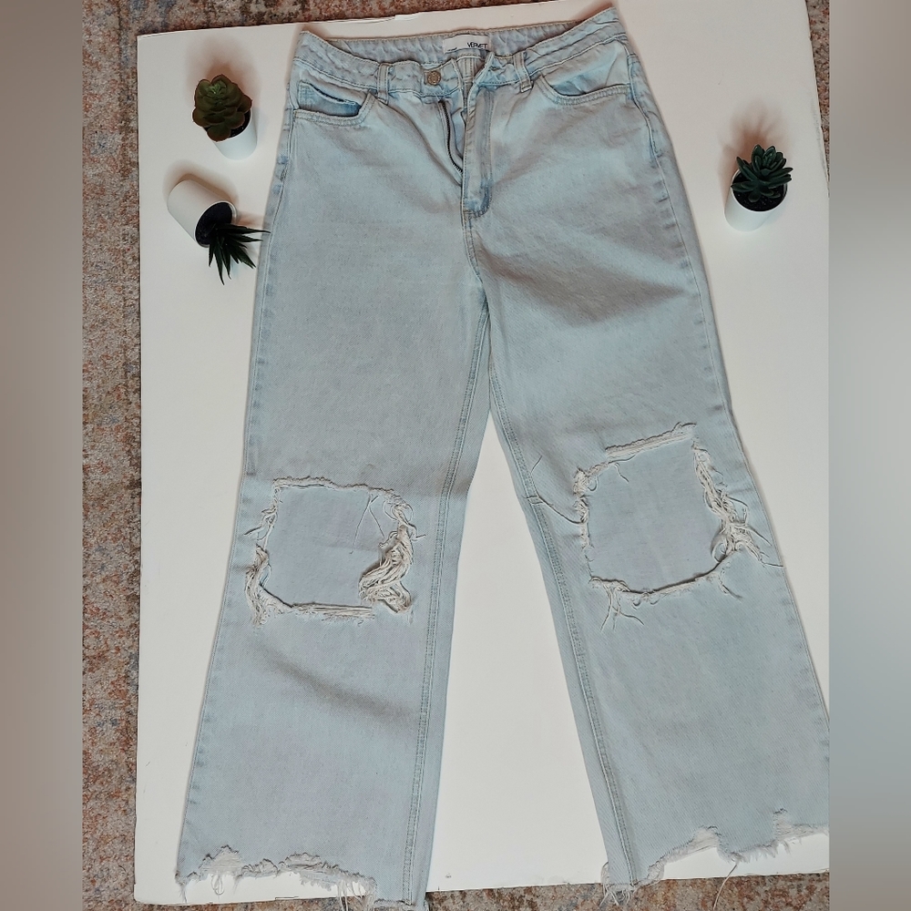 Distressed denim jeans